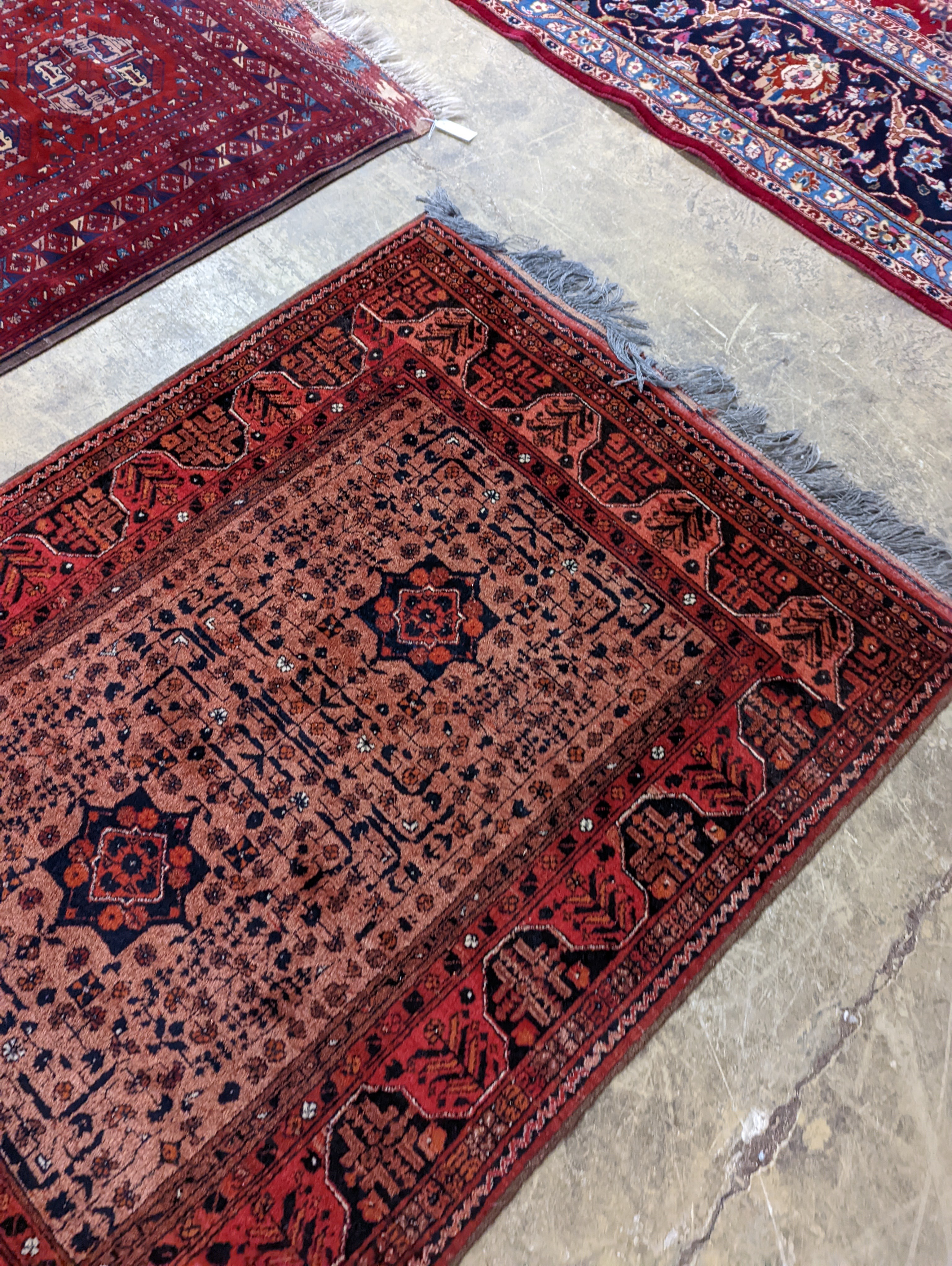 A Belouch red ground rug, 148 x 106cm
